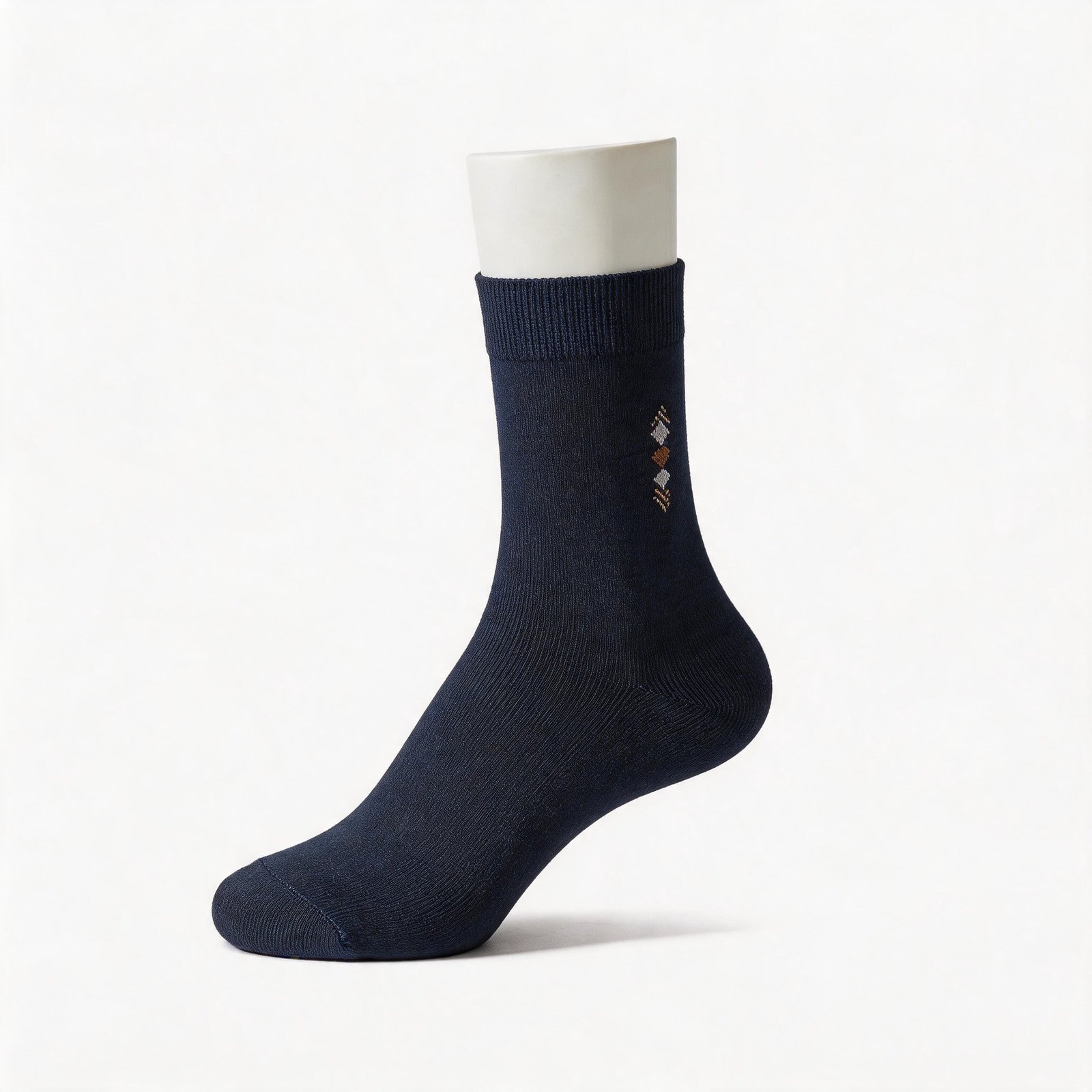 Navy blue everyday crew sock with small diamond embroidery on a white background